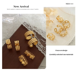 Detailed view of layered gold-plated titanium steel rings with geometric hollow designs