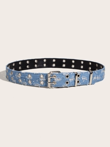 Detail of blue denim punk belt with silver star studs and double grommet eyelets