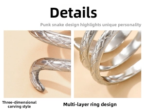 Macro shot of silver punk snake ring with 3D engraved scales and multi-layer spiral design