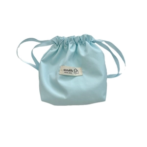 Light blue canvas drawstring storage pouch with dog logo for cosmetics and earphones