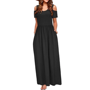 Detail of black off-shoulder maxi dress featuring high-waisted cut and flared skirt hem