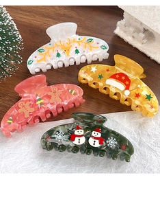 Vier festliche Haarklammern aus Acryl mit Rentier, Lebkuchenmann und Schneemann Motiven