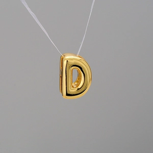 Polished gold plated letter D bubble pendant necklace with minimalist metallic finish
