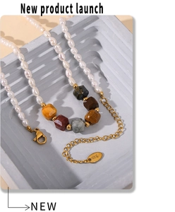 Close-up of freshwater pearls and hexagonal natural stones with a K18 gold-plated clasp