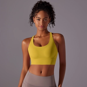 Vista frontale del reggiseno sportivo giallo acceso con scollo a U e fascia di supporto