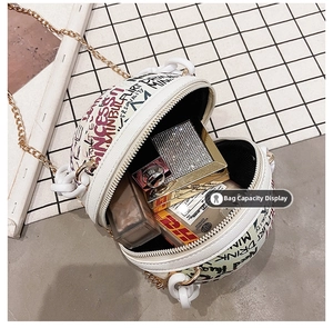 Inside view of basketball-shaped graffiti crossbody bag showing storage capacity