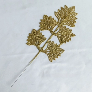 Detailed view of a 37cm golden glitter artificial leaf for Christmas festive decoration