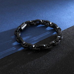 Detail of matte black geometric anchor chain bracelet for men with creative hip hop style