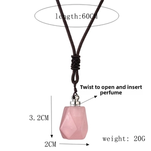 Macro view of pink quartz perfume bottle pendant with size dimensions and 60cm chain