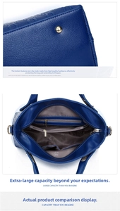 Detail of embossed leather handbag showing interior compartments and gold base studs