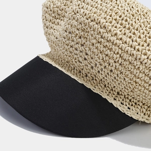 French retro straw baker boy hat with black brim and beige woven texture detail