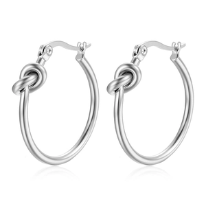 Minimalist silver knot hoop earrings made of polished stainless steel for women