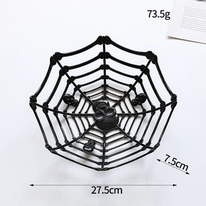 Black spider web fruit bowl with skull accents for Halloween bar and home decor