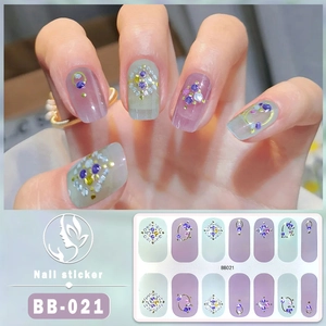Detail view of 5D BB-021 nail sticker with light cyan base and golden ring elements