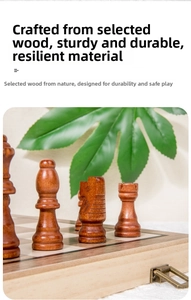 Close-up of hand-carved wooden chess pieces on a foldable magnetic wooden board