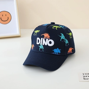 Detail of kids baseball cap with DINO embroidery and colorful dinosaur patterns
