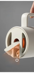 Detail of 75-degree gravity automatic opening lid on glass oil dispenser bottle