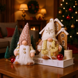 Plush Christmas gnomes with warm LED lights and sequin hats for holiday window display