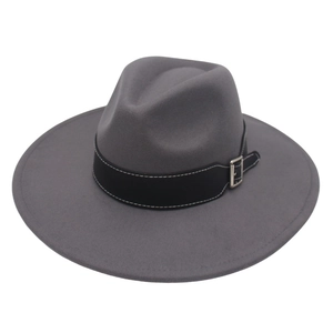 Detail view of a dark grey wide-brim wool fedora hat with a black belt and silver buckle