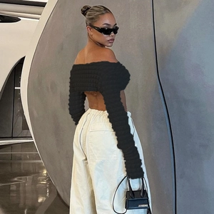 Black off-shoulder hollow out cropped top with long sleeves in a modern street style