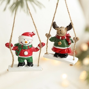 Resin Christmas tree ornaments featuring a snowman and reindeer on wooden swings