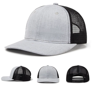Detail view of grey and black trucker hat featuring breathable mesh and snapback closure
