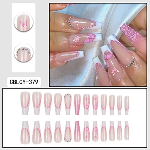 Pink long ballet French press-on nails with butterfly design and glitter rhinestones