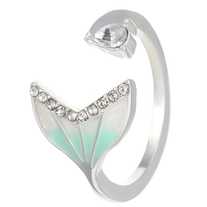 Macro shot of silver mermaid tail ring with mint enamel and pear-shaped crystal