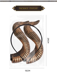 Detail view of large bronze devil horns headband in packaging with dimensions 29x15cm