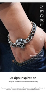 Detail of a punk skull bracelet in vintage silver finish worn by a male model