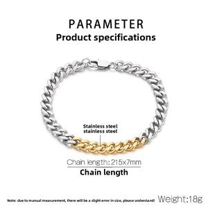 Close-up of dual-tone gold and silver stainless steel Cuban link bracelet details