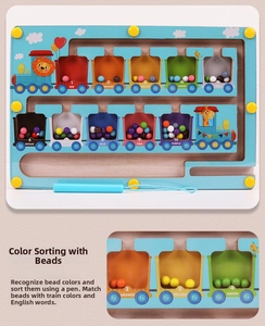 Detail of wooden magnetic color sorting maze with beads and magnetic pen for toddlers