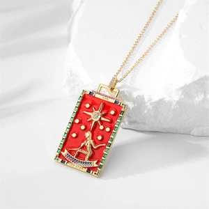 Detail of The Star gold necklace with red enamel pendant and colorful crystal stones
