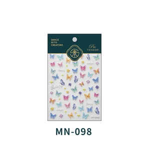 Detailed macro view of 5D embossed butterfly nail art stickers with shimmering finish