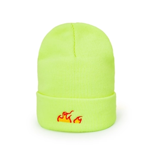 Close-up of vibrant neon yellow knit beanie featuring red flame embroidery detail