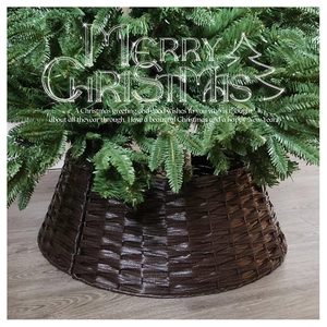 Detail of dark brown woven Christmas tree collar with a festive Merry Christmas overlay