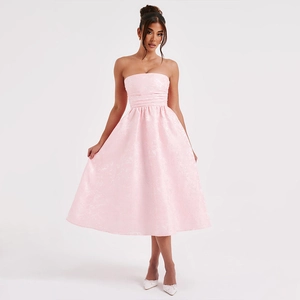 Detail of light pink strapless midi dress featuring a cinched waist and pleated A-line skirt