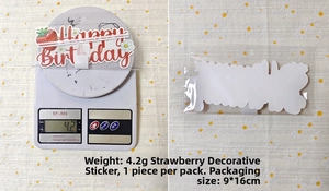Detail of strawberry happy birthday cake topper showing weight 4.2g and 9x16cm packaging size