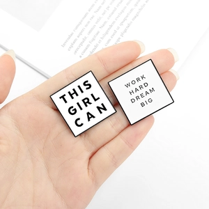 Enamel square brooch set with This Girl Can and Work Hard Dream Big quotes in black and white
