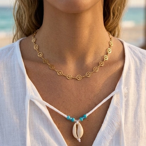 Layered gold spiral chain with blue beaded seashell pendant necklace for beach vacations