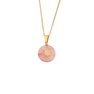 Gold stainless steel necklace with pink stone round pendant featuring a golden sun symbol