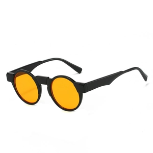 Retro round black frame sunglasses with orange lenses shown at a 45-degree angle