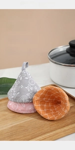 Three cotton pot ear caps in floral and grid patterns for heat insulation and safety