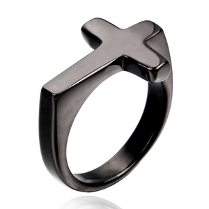 Detail view of the black stainless steel cross ring with a matte industrial finish