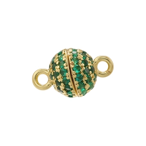 Close-up of golden spherical magnetic clasp with green pave crystals and dual loops