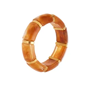 Detailed size specifications for amber resin bangle with stainless steel accents
