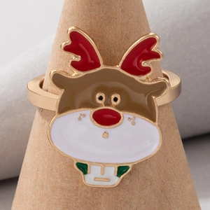 Detailed view of enamel reindeer ring with gold alloy band on a wooden display stand