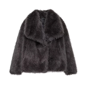 Detailed view of dark grey faux fur coat featuring fluffy texture and large lapel collar