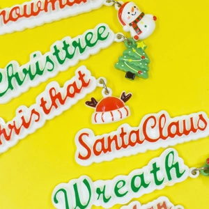 Colorful Christmas resin charms set with festive patterns for DIY crafts and phone cases