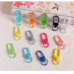Detailed view of colorful lobster clasps for DIY jewelry making and keychains